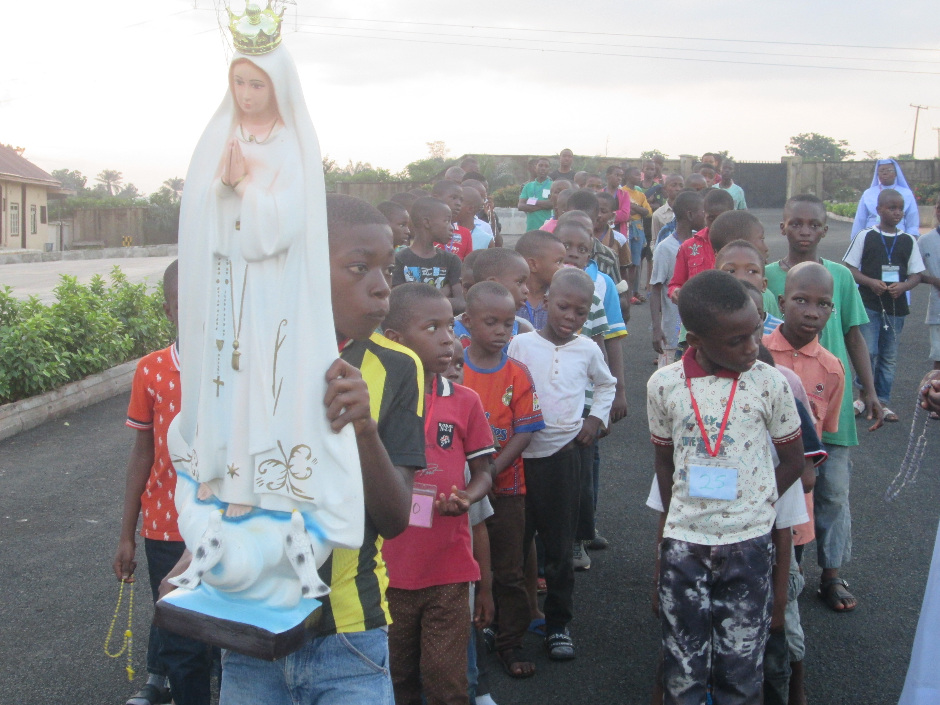 pro-life march with young people with rosary procession